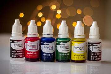 Alcohol Ink Starter Kit - 4 Inks, 2 Blending Solutions and 5 sheets YUPO
