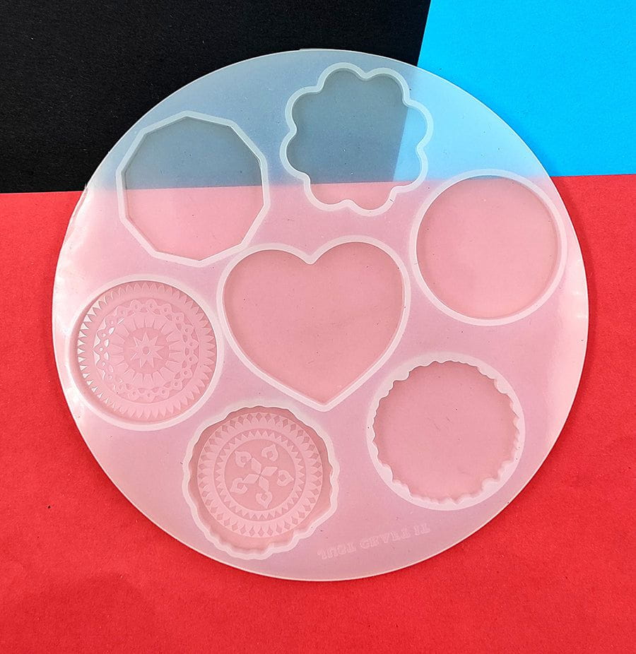 7 CAVITY POP SOCKET, PENDANT & KEYCHAIN MOULD 47102